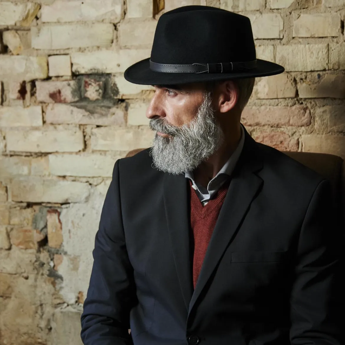 Czarny wełniany kapelusz fedora z płaskim rondem Flavio Moda
