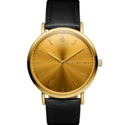 Moment | Zegarek elegancki minimalistyczny w kolorze złota z analogowym mechanizmem kwarcowym, tarczą w kolorze szampańskim & czarnym skórzanym paskiem